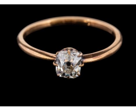 A diamond single stone ring,: the old cushion shaped diamond estimated to weigh 0.50 carats, in a claw setting, ring size O.