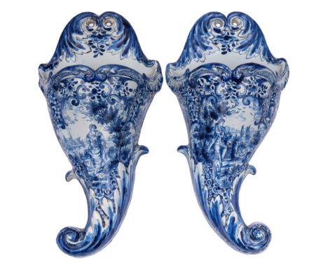 A pair of large Dutch blue and white delftware cornucopiae wall pockets: in 18th century style, moulded with shells and acant