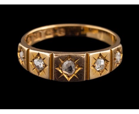 A late Victorian 18 carat gold and diamond ring,: set with five rose cut diamonds, stamped 18 with full Birmingham hallmarks 