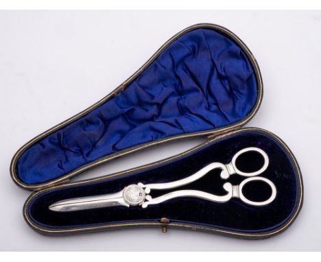 A George V silver pair of grape shears, maker William Hutton & Sons Ltd, Sheffield, 1912: of scissor action, contained in a f