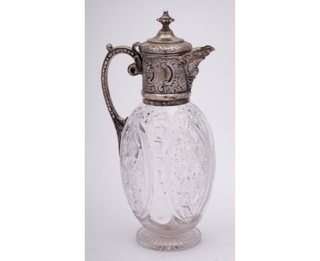 A Victorian cut glass and silver mounted claret jug, maker Mappin Brothers, London, 1897: the hinged domed lid with beaded ur