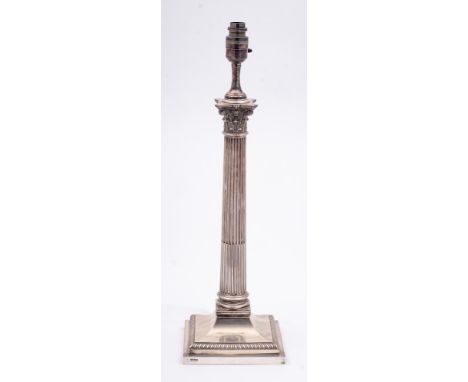 A George V silver Corinthian column table lamp, maker's mark worn, Sheffield, 1911: with acanthus decorated capital, stop flu