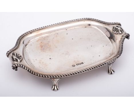 A George V silver teapot stand, maker William Hutton &amp; Sons Ltd, Sheffield, 1919: of rectangular outline, with gadrooned 