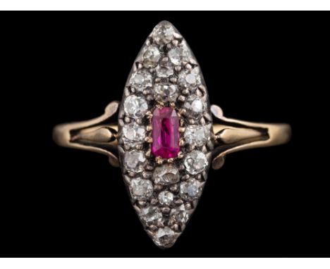 A ruby and diamond ring,: the navette shaped panel set with a central rectangular cut ruby, within a surround of old cut diam