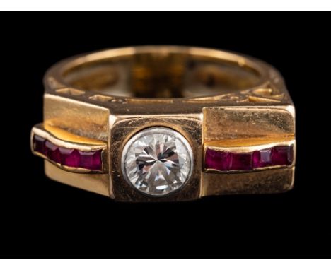 A 1940s diamond and ruby ring,: the brilliant cut diamond estimated to weigh 0.80 carats, in a collet setting between square 