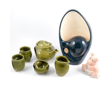 Holkham Pottery blue and cream lamp base, green glazed two person tea set, Wade pig.