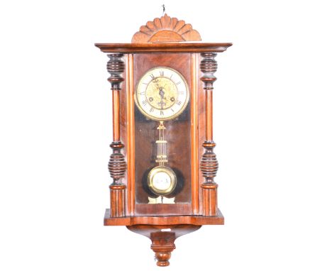 19th Century Vienna type walnut wall clock, circular ivorine dial, the movement striking on a gong, height approximately 69cm