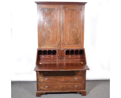 George III mahogany bureau bookcase, cavetto moulded cornice, the upper section with panelled doors enclosing adjustable shel