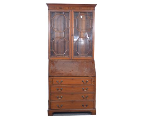 Edwardian mahogany bureau bookcase, moulded cornice, the upper section with glazed doors enclosing two adjustable shelves, th