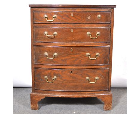 Small oak bowfront chest of drawers, the top with reeded edge, four long graduating drawers, bracket feet, width 59cm, depth 