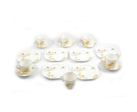 A Heathcote 'Country Cottage' pattern bone china teaset, comprising plates, cups and saucers.