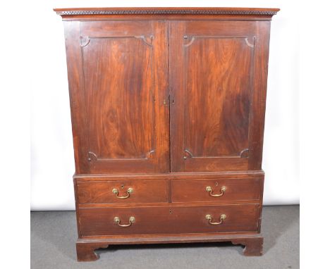 George III mahogany linen press, of small proportions, key and cavetto moulded cornice, two panel doors enclosing four origin