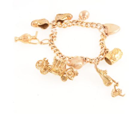 A 9 carat yellow gold 6.5mm gauge solid curb link bracelet with fancy engraved padlock fastener and safety chain, London 1964