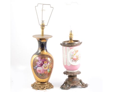 A French porcelain table lamp, pink ground with white and faded gilt borders, floral panel to one side, cherubs with fruit to