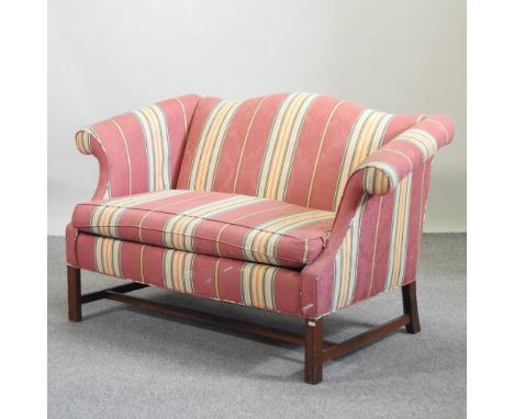 A Georgian style striped upholstered two seater sofa, 142cm