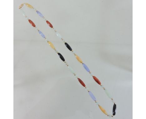 A 14 carat coloured jade necklace