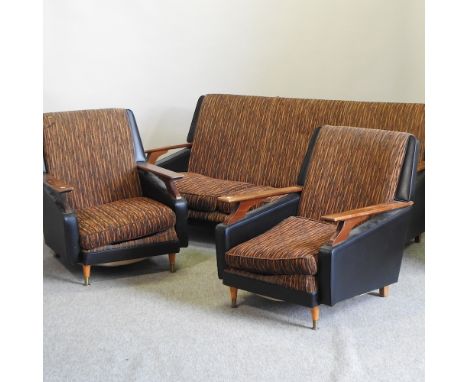 A 1970's teak and upholstered three piece suite, sofa 168cm