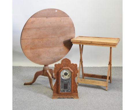 A 19th century American gingerbread clock, together with a tripod table and a folding butler's tray (3)