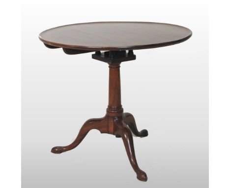 A George III mahogany tripod table, with a birdcage action, 79cm diameter