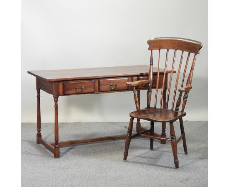 An oak side table, containing three drawers, 136cm, together with a stick back chair