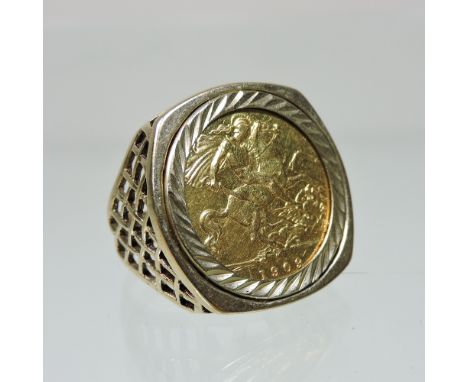 A gentleman's gold ring, set with an Edwardian VII half sovereign, dated 1909