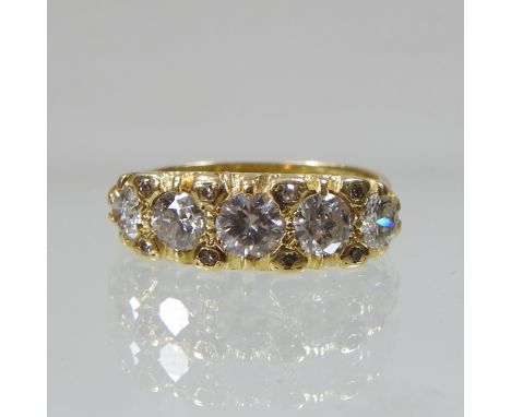 An 18 carat gold diamond half hoop eternity ring, set with a single row of graduated stones, with a textured setting, approxi