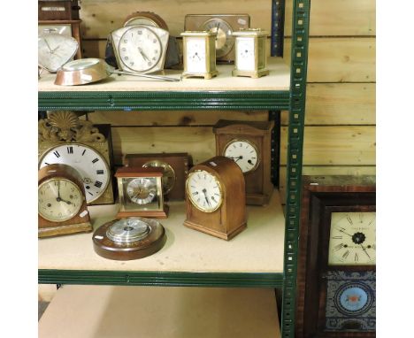 An American shelf clock, signed Hills Bros Long Melford, together with a cuckoo clock and two shelves of various other clocks