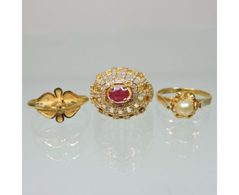 A 22 carat gold ladies diamond cluster ring, together with a 22 carat gold dress ring and other set with a single pearl (3)