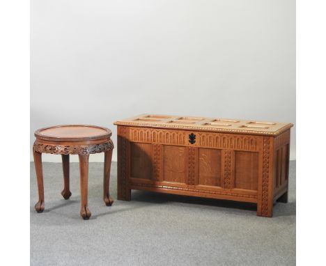 A light oak coffer, with panelled decoration, 121cm, together with a Chinese hardwood occasional table