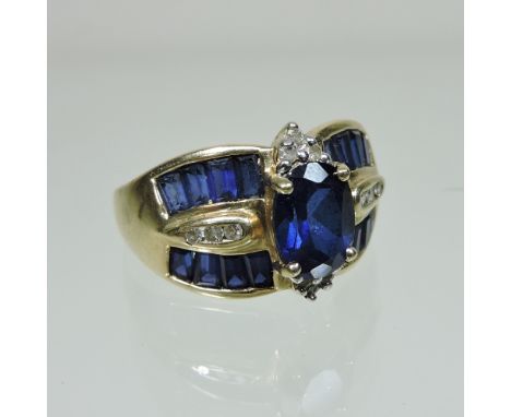 A 10 carat gold sapphire and diamond dress ring