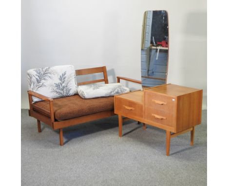 A 1970's drop arm two seater sofa, together with a 1970's dressing table, 86cm