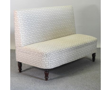 A contemporary cream geometric pattern upholstered sofa, 145cm