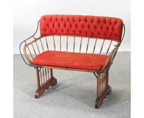 Early 20th century elm spindle back two seat carriage sofa