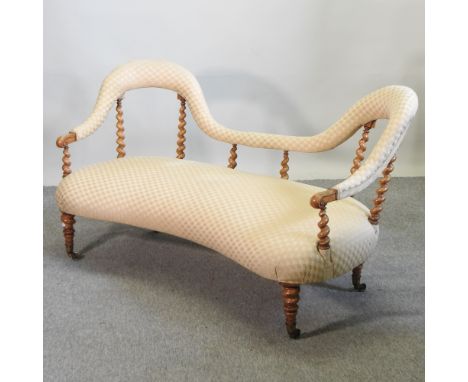 A Victorian walnut sofa, with spirally turned arms, 160cm