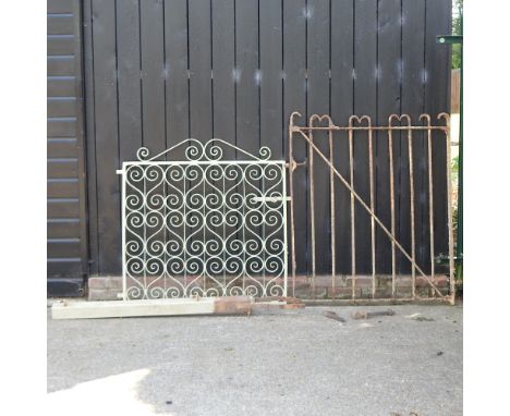 A green painted iron garden gate, 110 x 108, together with another, 128 x 106cm