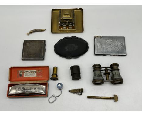 Assorted Lot to include HM Silver Cigarette Case, Harmonica, Sixpence Holder, Opera Glasses and others. 