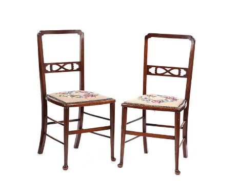 PAIR OF EDWARDIAN MAHOGANY PIERCED BACK OCCASIONAL CHAIRS WITH TAPESTRY SEATS.RAISED ON PAD FEET.HEIGHT: 34 INCHES.WIDTH: 16 