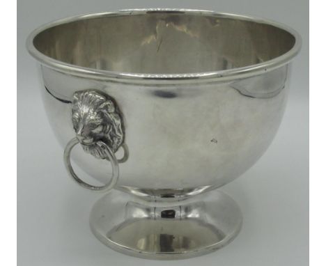 Large Geo.111 style hallmarked silver circular bowl, with reeded rim and lion mask and ring handles on stepped circular foot,