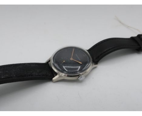 Jaeger Lecoultre mechanical wristwatch, chromium plated case on leather strap, snap on stainless steel case back no. 16239, J