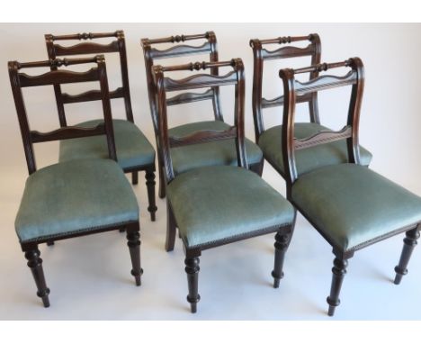 Set of six Victorian mahogany dining chairs, with turned top rail, twin serpentine splats and stuffed over seat on ring turne