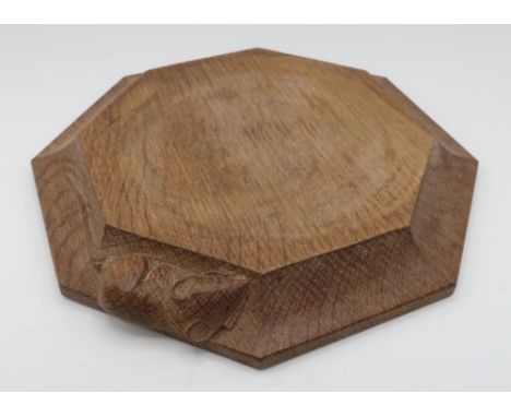 Robert Mouseman Thompson - an adzed oak octagonal teapot stand, carved with signature mouse, D19cm 