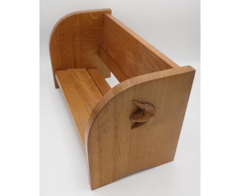 Coxwold Cabinet Makers  - an oak extending book trough, carved with signature unicorn,  W43cm D16cm H19cm max 