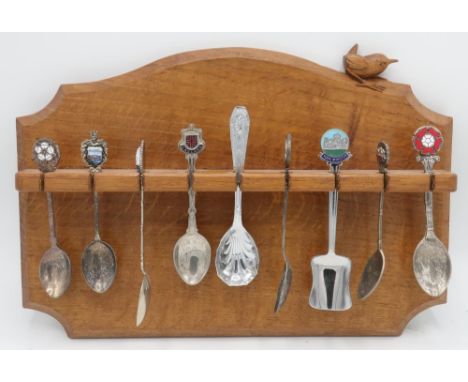 Bob Wren Man Hunter - an oak spoon rack, with arched top and single shelf, carved with signature wren W31cm H20cm, and a coll