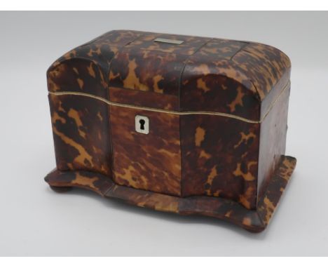 Victorian tortoishell breakfront tea caddy, hinged lid with cartouche engraved R, interior with two lids, on four ball feet, 