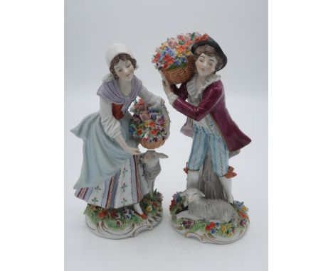 Pair of 20th century Sitzendorf porcelain figures of lady and gentleman flower sellers, each wearing 18th Century costume on 