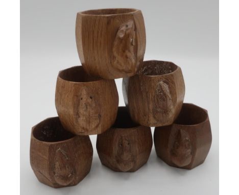 Robert Mouseman Thompson - set of six adzed oak napkin rings, carved with signature mouse, H5cm (6) 