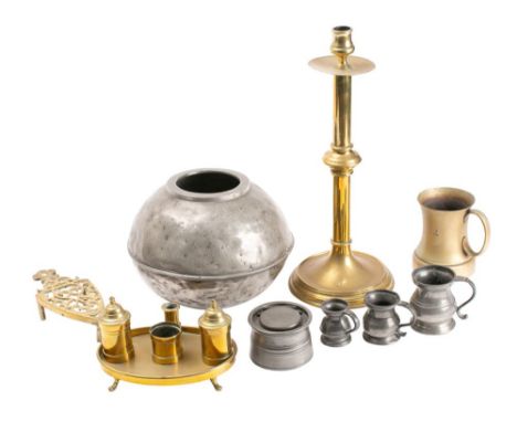 A small quantity of 19th century domestic metalwares including;- a standish, a trivet, three pewter measures, together with t