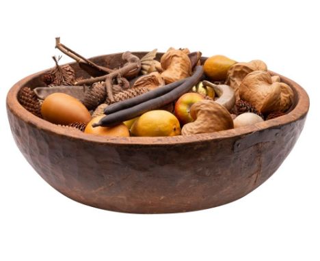 A hardwood dairy bowl of large proportions, 19th century, of circular outline, approximately 71cm diameter; presented with a 