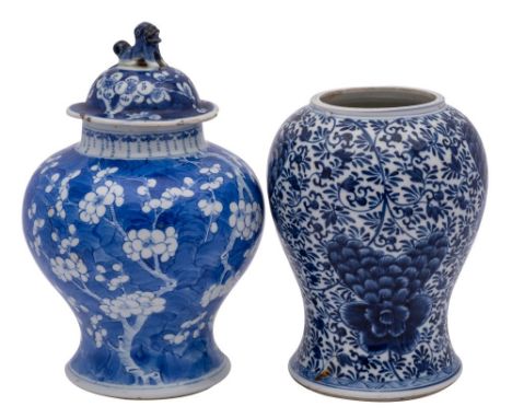 A Chinese blue and white baluster vase and a similar yen yen vase [reduced], Kangxi or later, the first painted with flowerin
