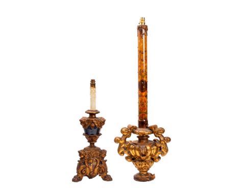 An Italian carved, parcel gilt and polychromed wood table lamp, 20th century, the urn form body carved with cherub masks, abo